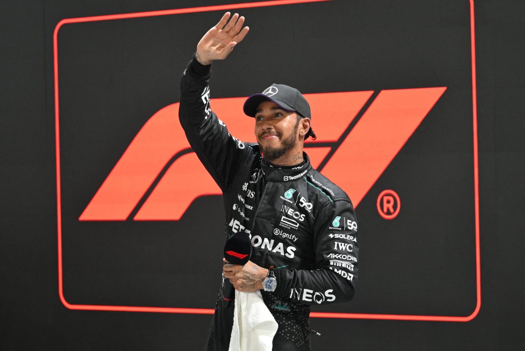 Lewis Hamilton waves to the crowd