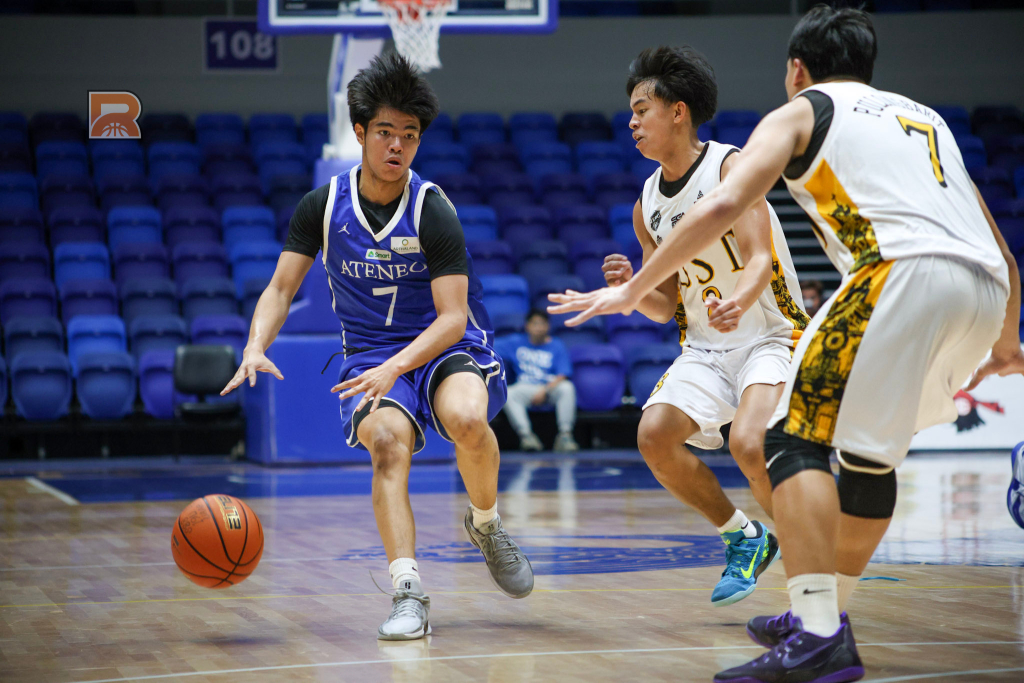 Zane Kallos of Ateneo dribbles