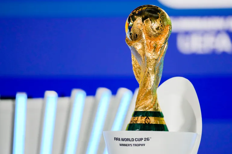 The FIFA World Cup 26 trophy is displayed during the UEFA Preliminary Draw at FIFA headquarters in Zurich, Switzerland